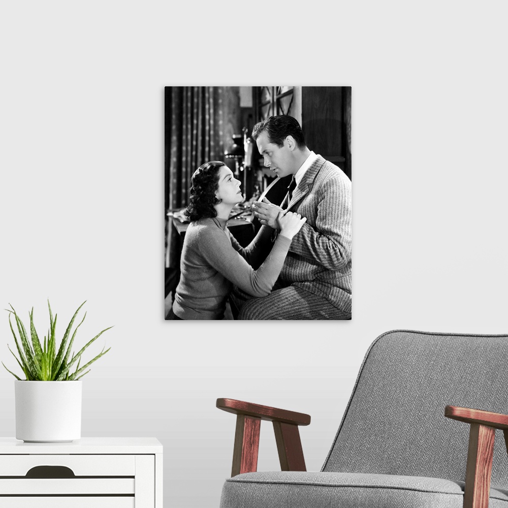 A modern room featuring Rosalind Russell and Robert Montgomery in Night Must Fall - Movie Still