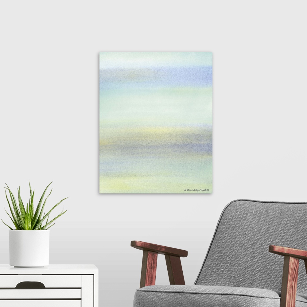 A modern room featuring Abstract watercolor painting in pale tranquil blue, green, purple, and yellow hues.