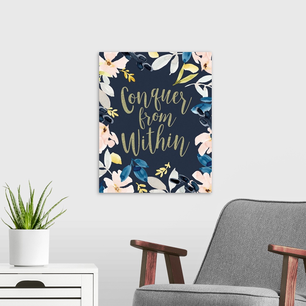A modern room featuring "Conquer From Whithin" in gold surrounded with watercolor floral.
