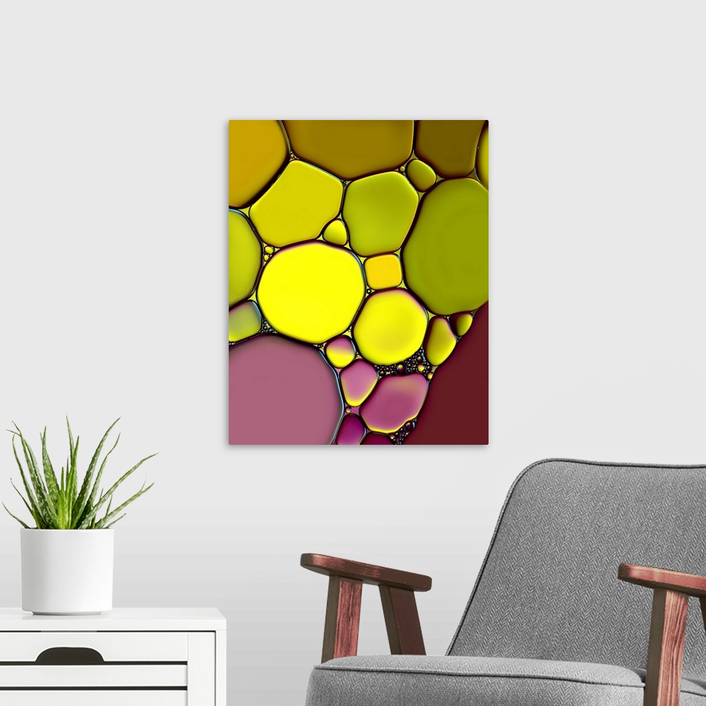 A modern room featuring Abstract image created by oil bubbles with green and purple light.