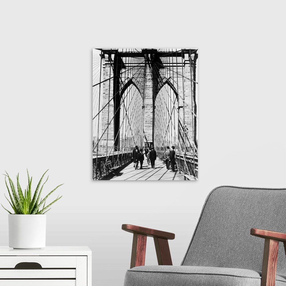 A modern room featuring 1800's 1880's Men Standing On Brooklyn Bridge Just After It Opened 1883 New York City USA.