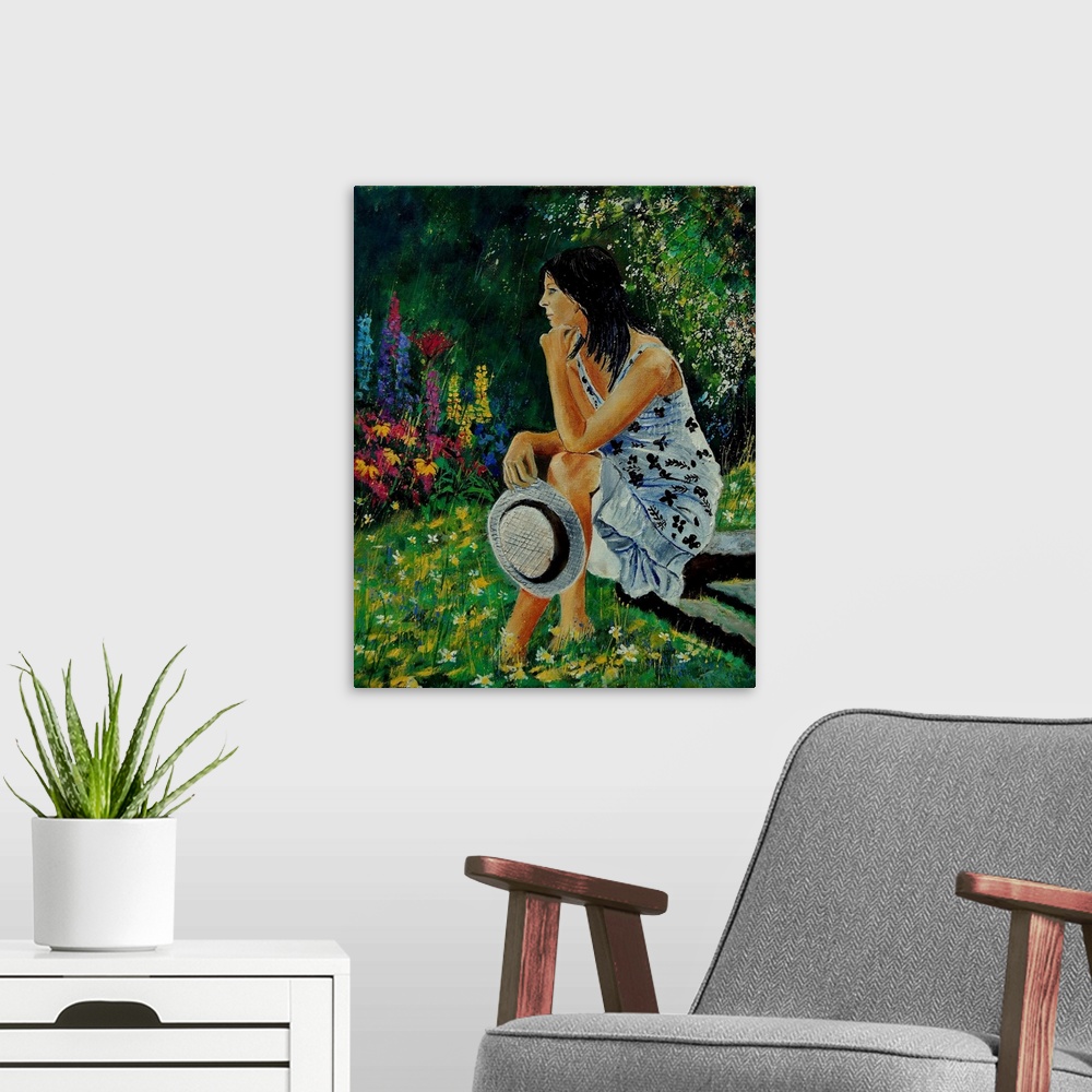 A modern room featuring Vertical portrait of a woman sitting in a garden full of blooming flowers in the spring.