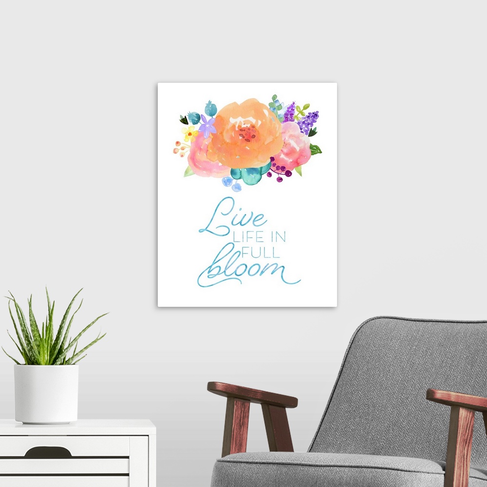 A modern room featuring "Live Life In Full Bloom" in blue with colorful watercolor flowers on a white background.