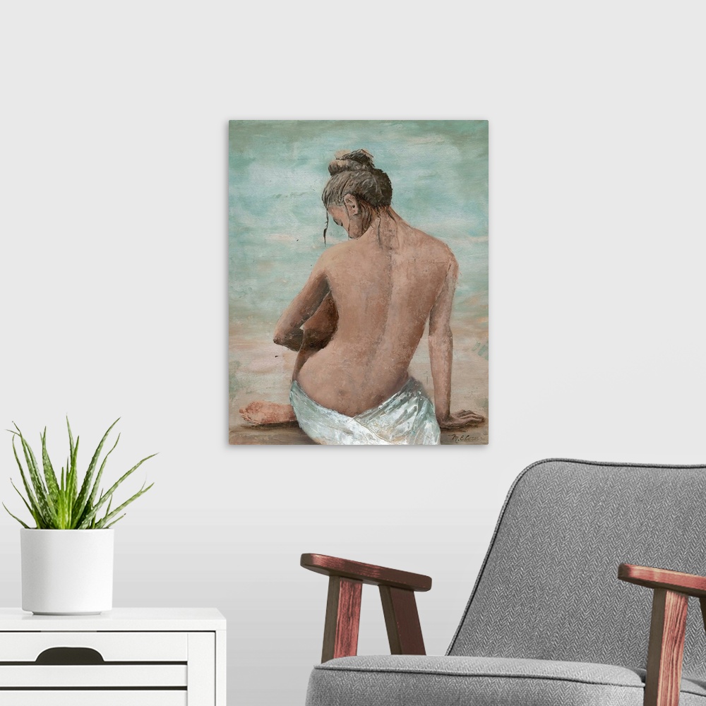 A modern room featuring A portrait of the back side of a lady sitting, draped in a white cloth, on a blue and beige backd...