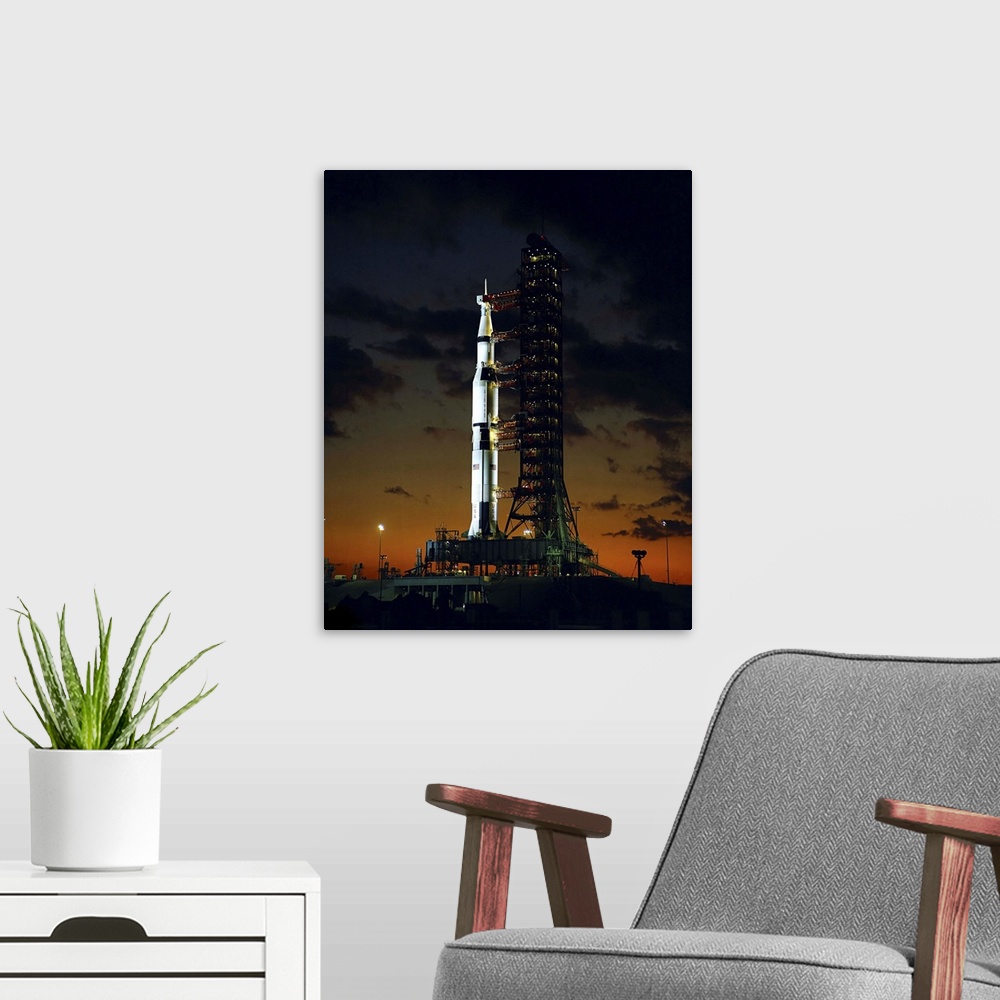 A modern room featuring An early morning view of the Apollo 4 Saturn V rocket at the launch complex.