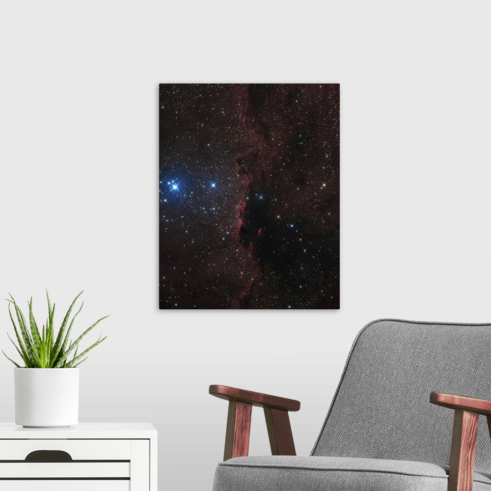 A modern room featuring NGC 6188, a wall of beautiful cosmic dust.
