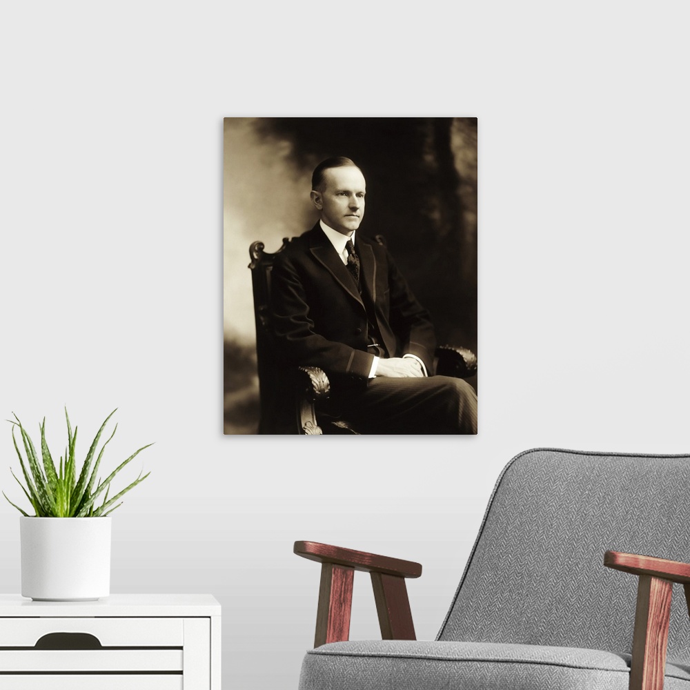 A modern room featuring Portrait of President Calvin Coolidge, dated 1919.