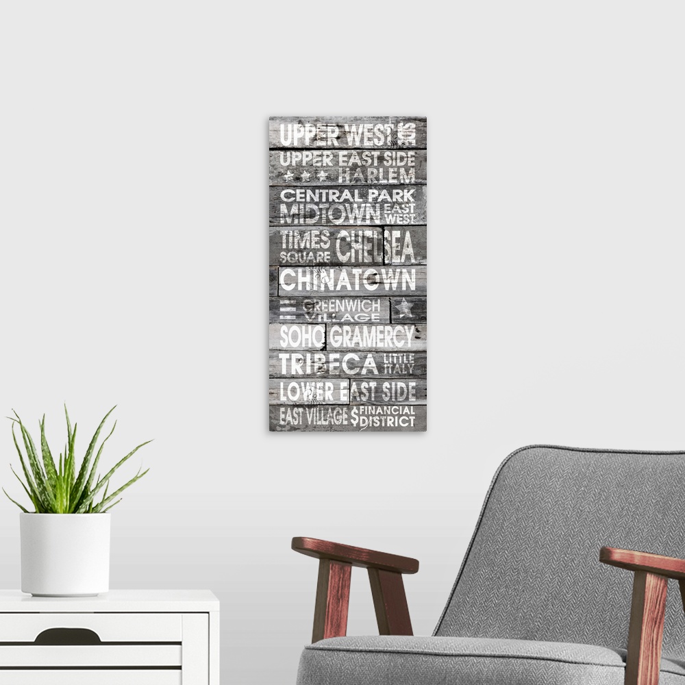 A modern room featuring Contemporary artwork of locations in a stressed stencil style on a wood plank looking background.