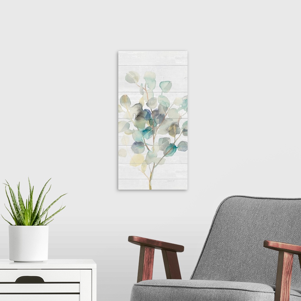 A modern room featuring Decorative artwork of watercolor eucalyptus leaves over a shiplap.