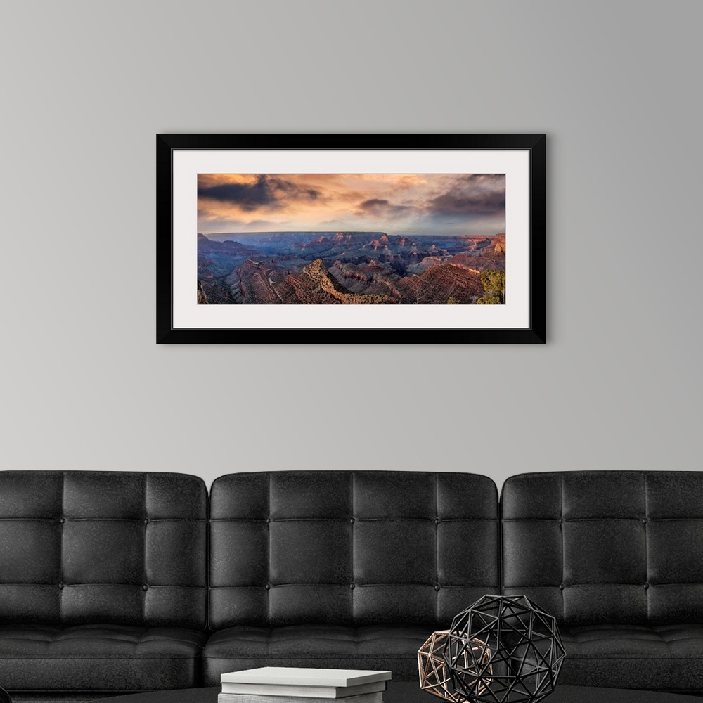 A modern room featuring Sunset with clouds panorama in the Grand Canyon.