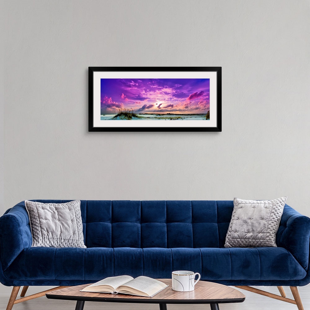 A modern room featuring Heavenly purple sunset skyscape panorama.