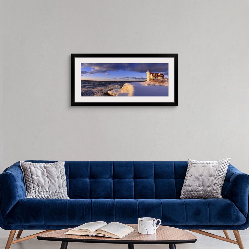 A modern room featuring Panoramic photograph taken of a snow-covered beach on the edge of a large lake within the Midwest...