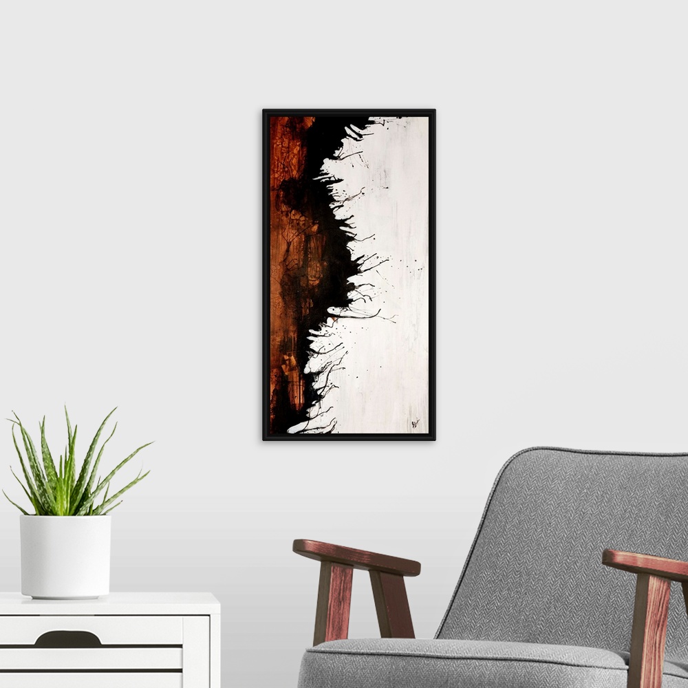 A modern room featuring Vertical panoramic painting of two contrasting colors separated by jagged ink splattered edge.