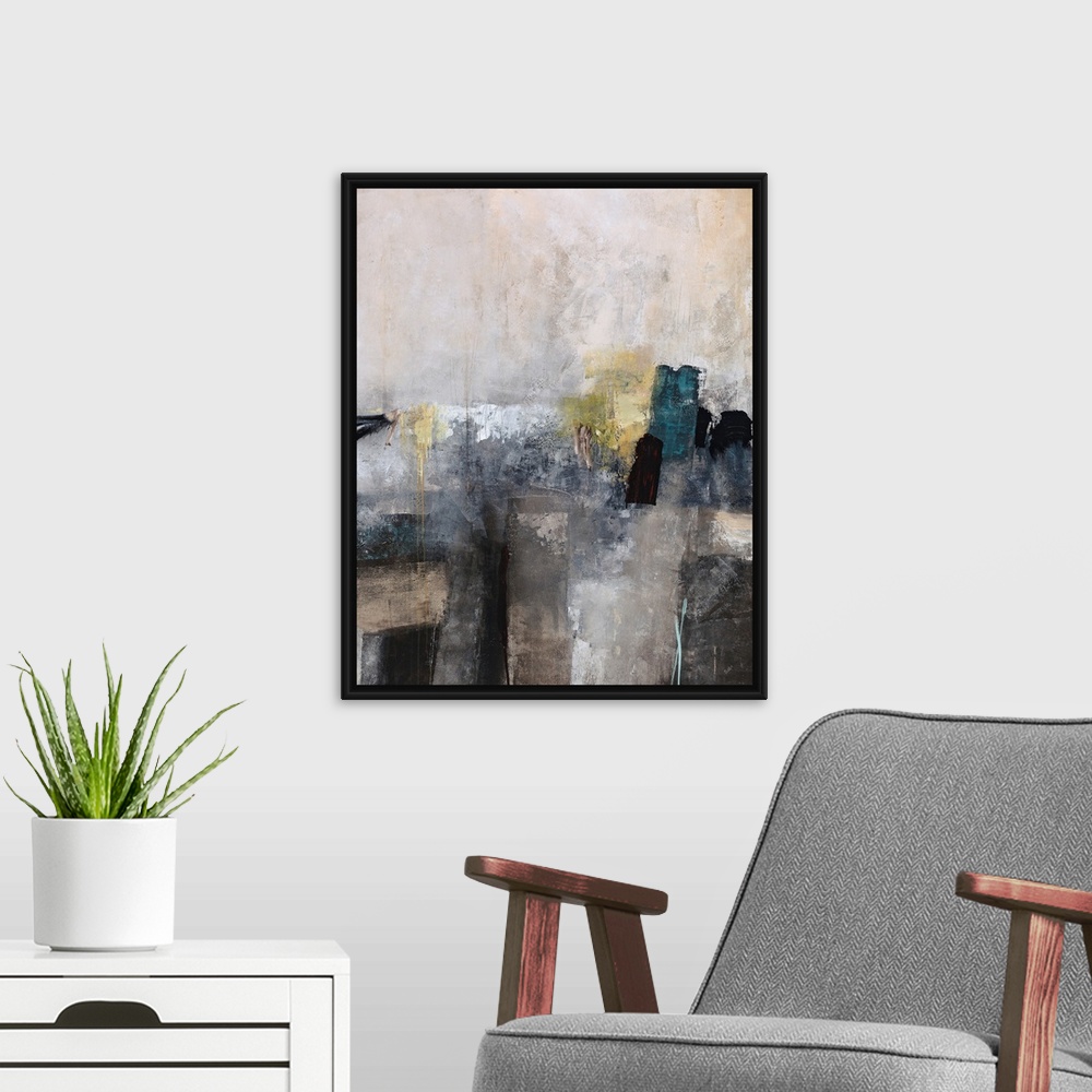 A modern room featuring Abstract painting done in soft, muted grays and browns with a hint of white and citron yellow.
