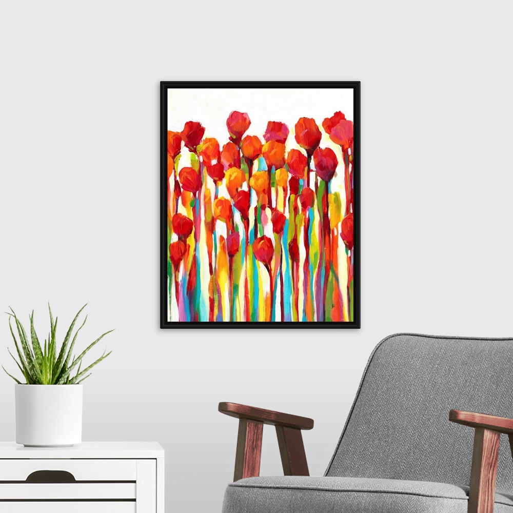 A modern room featuring Bright contemporary painting of red flowers with rainbow stems.