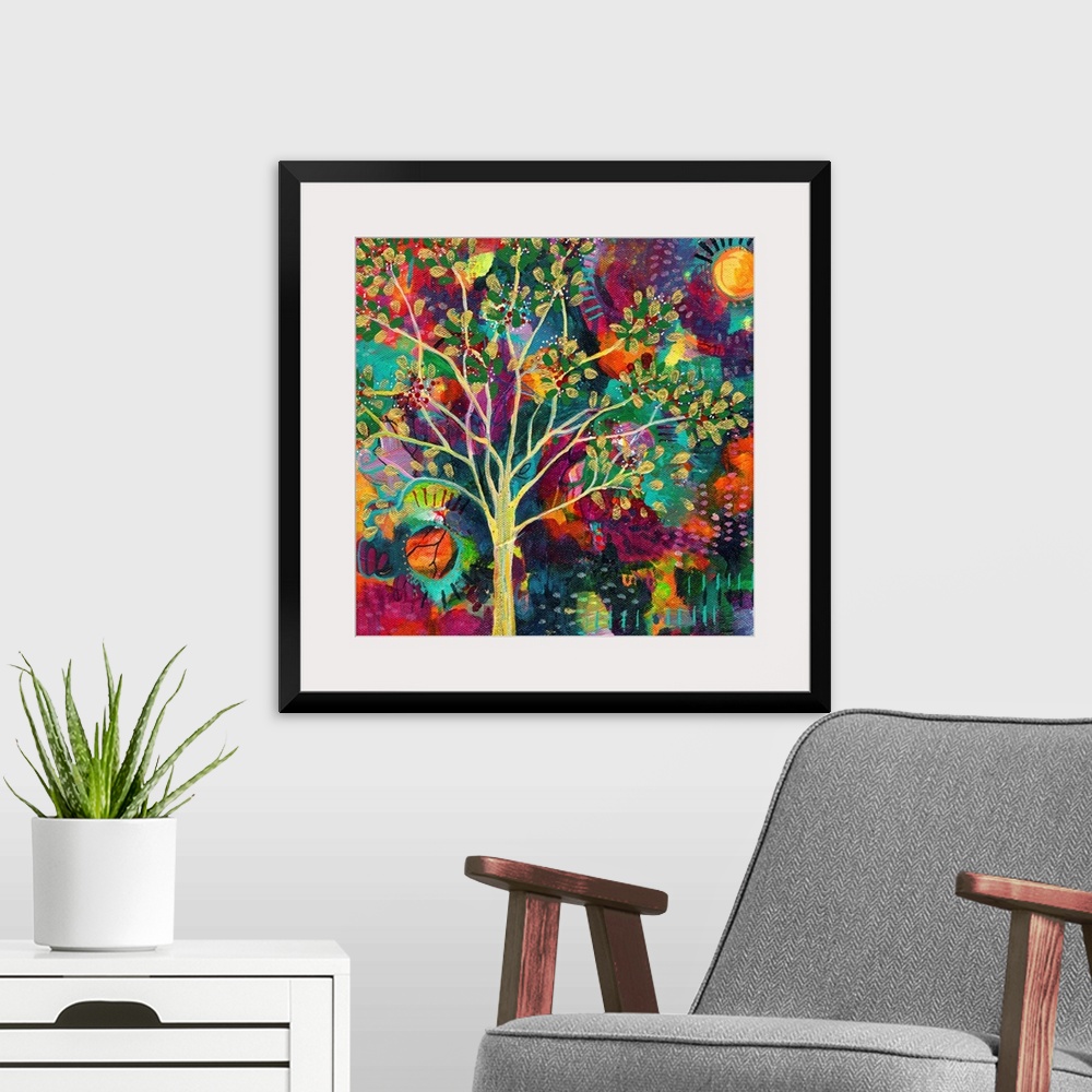 A modern room featuring Abstract painting of a golden tree on a busy, colorful, square background with a sun on each side.