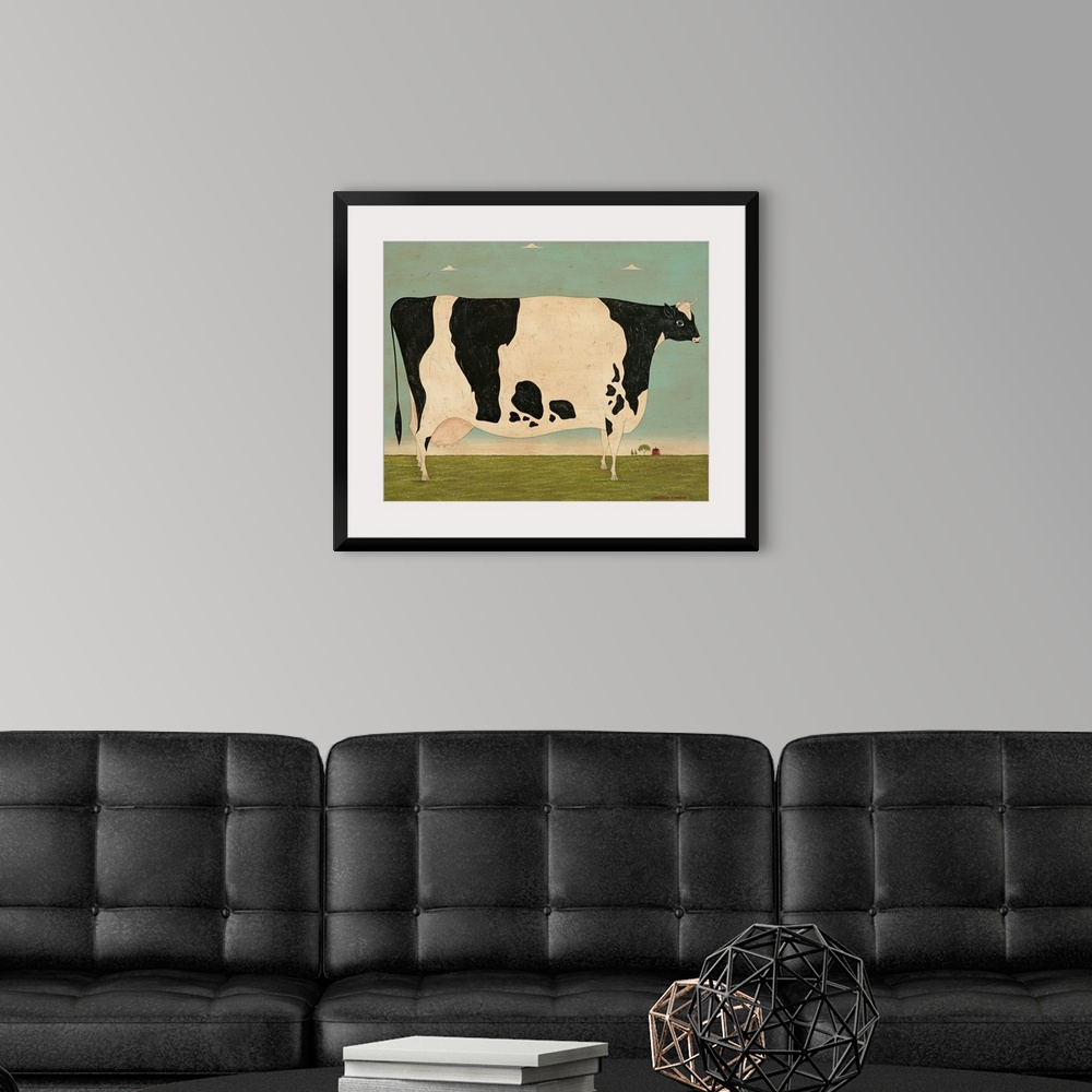A modern room featuring Painting of a very large spotted cow in a green pasture on a Vermont farm.