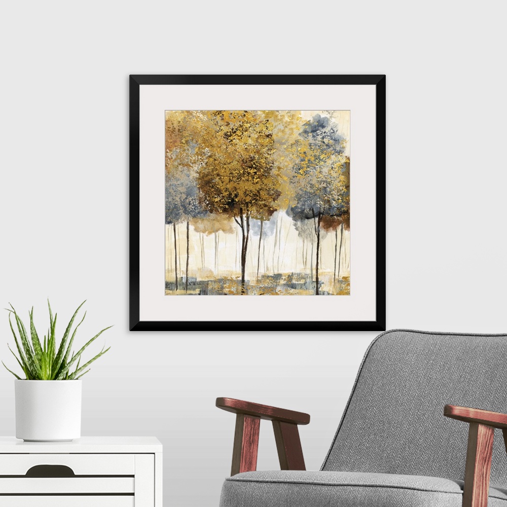 A modern room featuring Square decor with metallic gold and silver trees in an abstract forest.