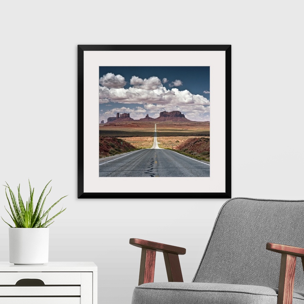 A modern room featuring Monument Valley.