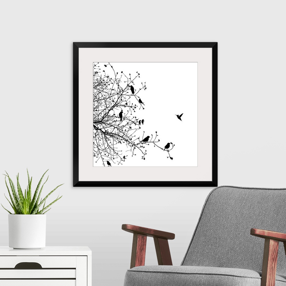 A modern room featuring A black and white illustration of a group of birds sitting on a tree branch.