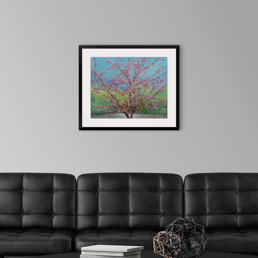 A modern room featuring Big floral painting that showcases a close-up of a Eastern Redbud Tree with rough texture.