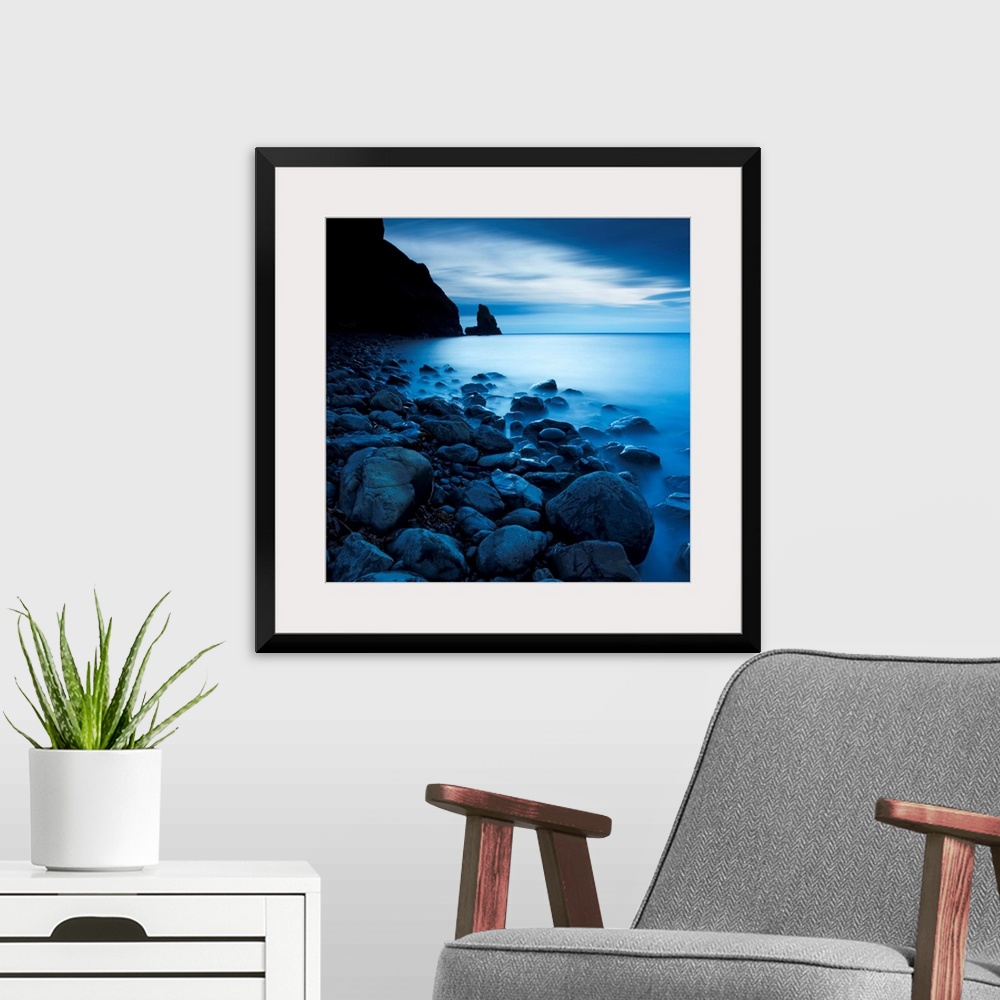 A modern room featuring This is a vertical landscape photograph of fog and water on rocky beach that would make great hug...