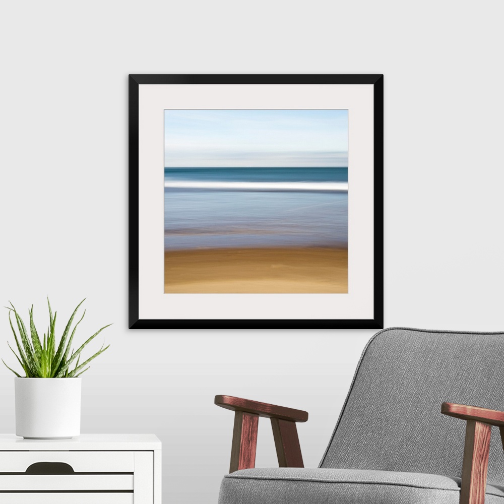 A modern room featuring A square canvas of a peaceful seascape with smooth color transitions.