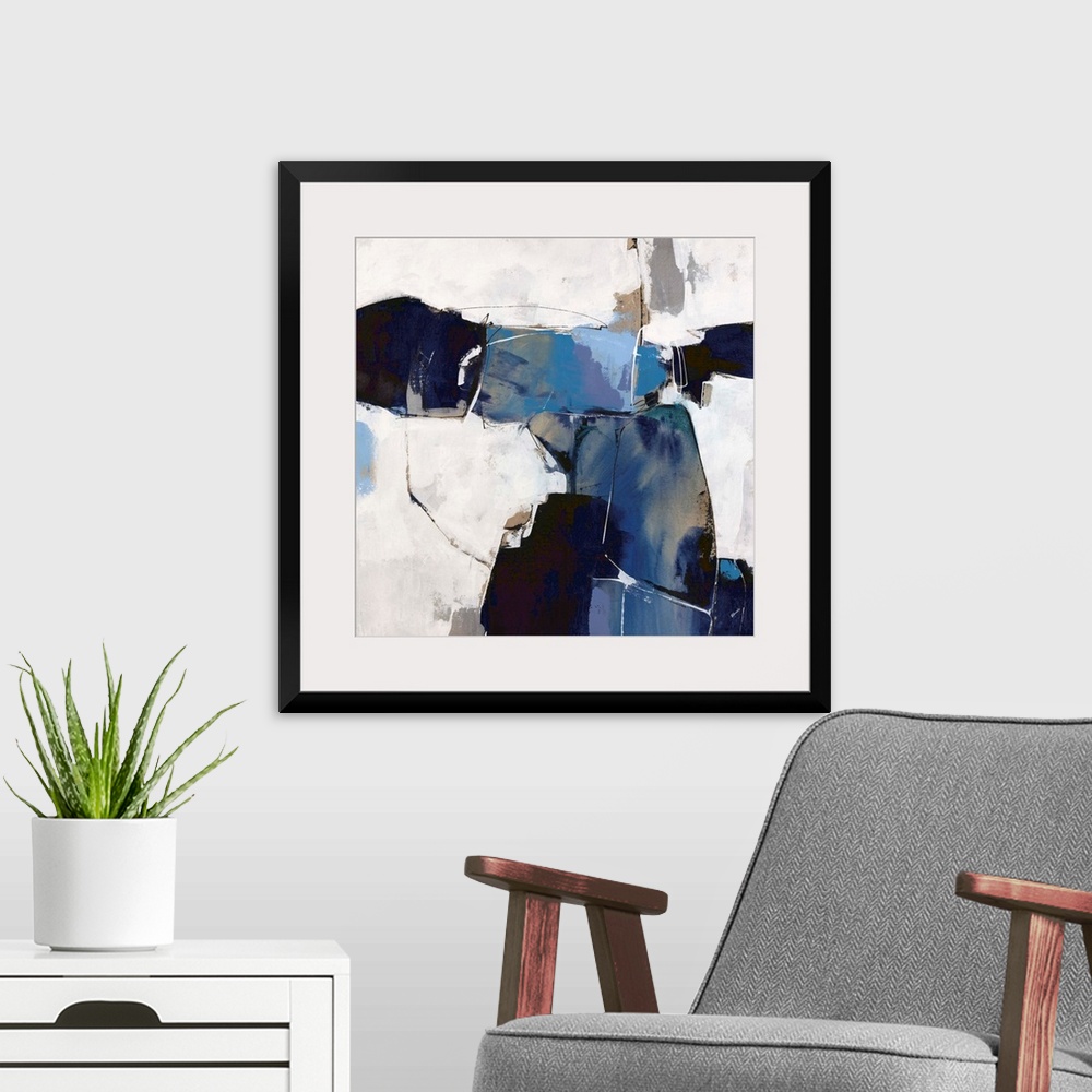 A modern room featuring A bold, contemporary abstract in shades of blue and navy on an off-white background. Touches of b...