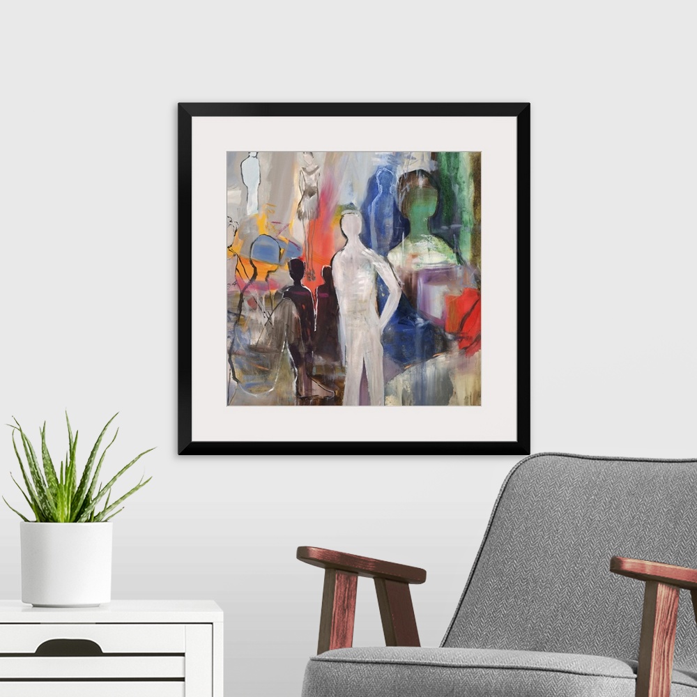 A modern room featuring Semi-abstract artwork with several figures in varying size and color.