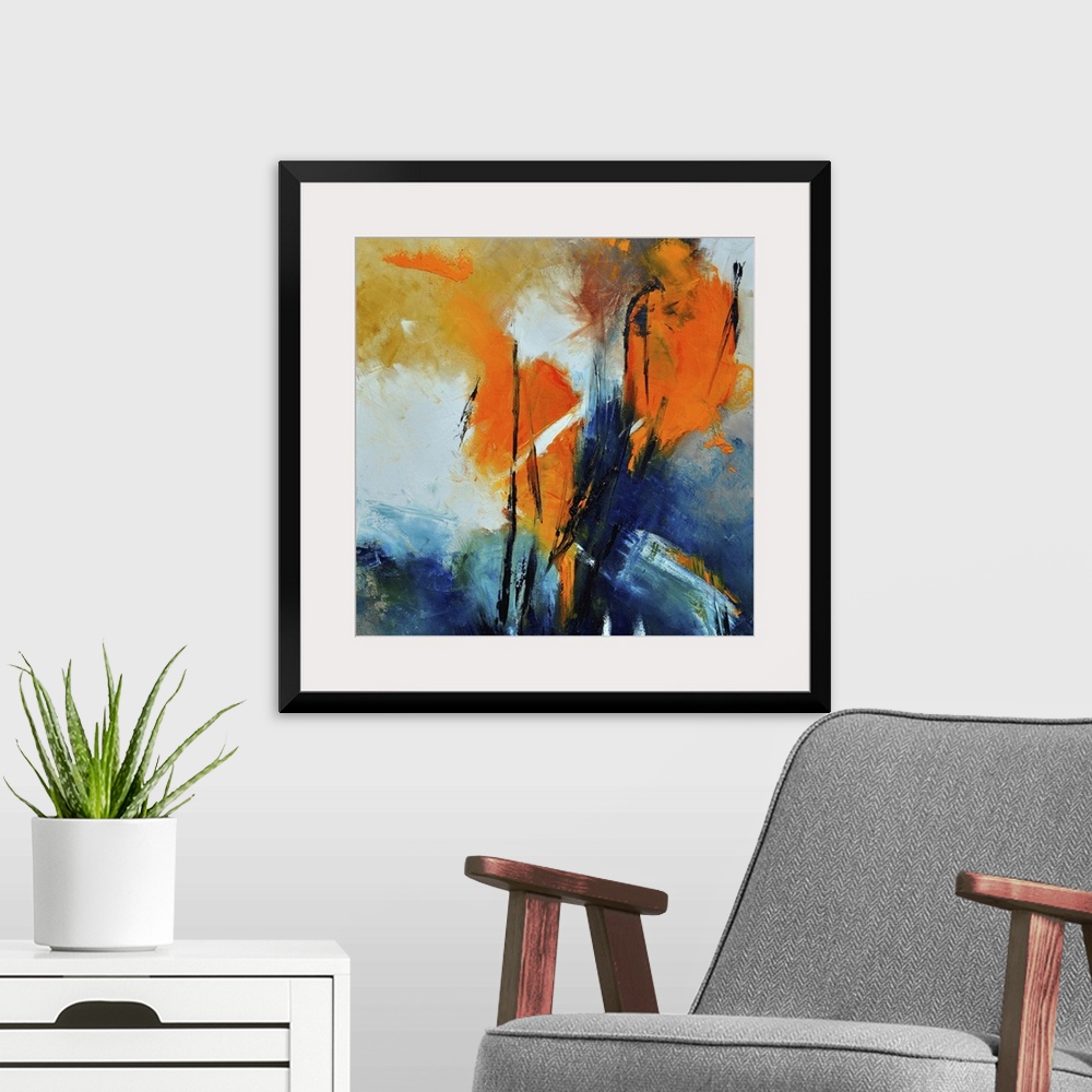A modern room featuring A square abstract painting with deep textured colors of orange and blue.