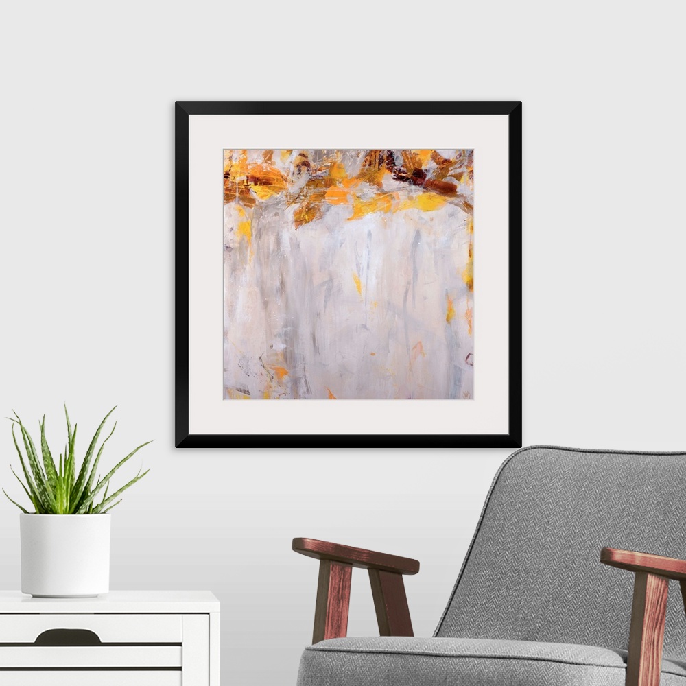 A modern room featuring Giant abstract art incorporates various distressed earth toned shapes at the top of the piece, wh...