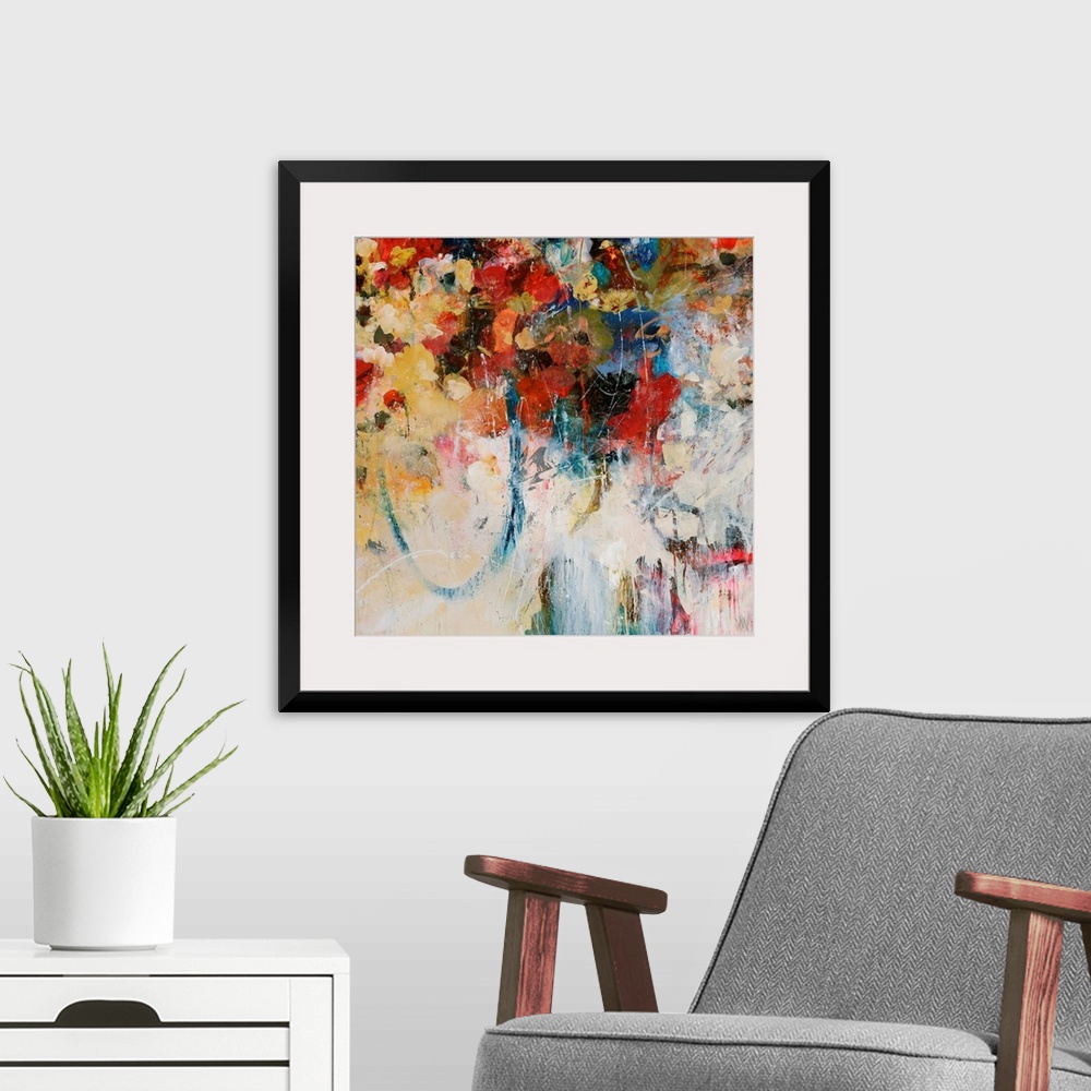 A modern room featuring Abstractly painted square canvas with different flowers painted in the top portion and faded colo...