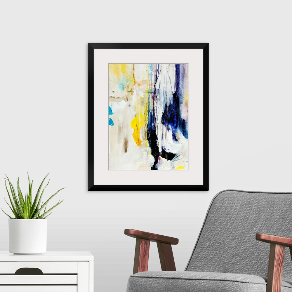 A modern room featuring Abstract painting of multicolored patches and shapes that appear to be dripping downward from the...