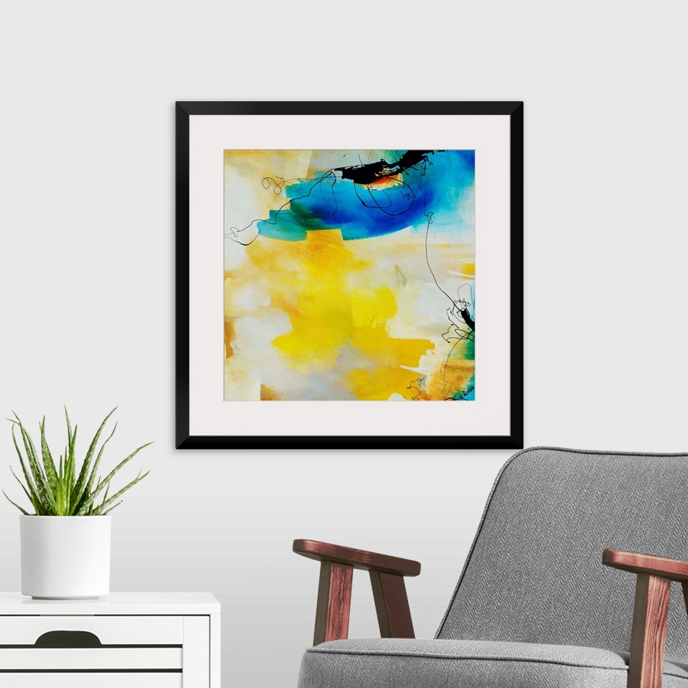A modern room featuring Abstract painting of fluid black lines overtop of vibrant yellow and blue brushstrokes.