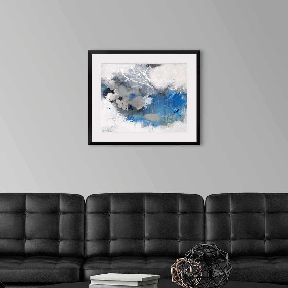A modern room featuring Contemporary abstract painting in white and blue, with white swirls.