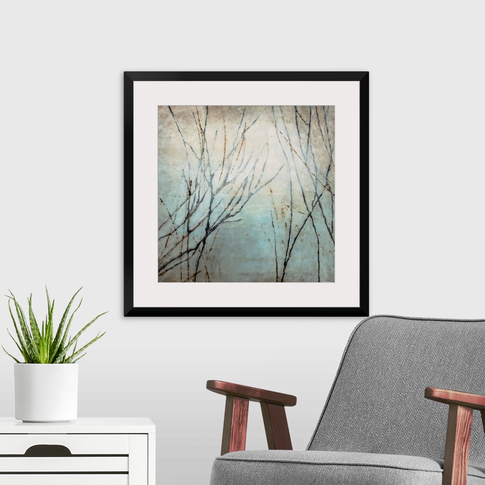 A modern room featuring Painting of tree limbs on top of a grungy backdrop on a square canvas.