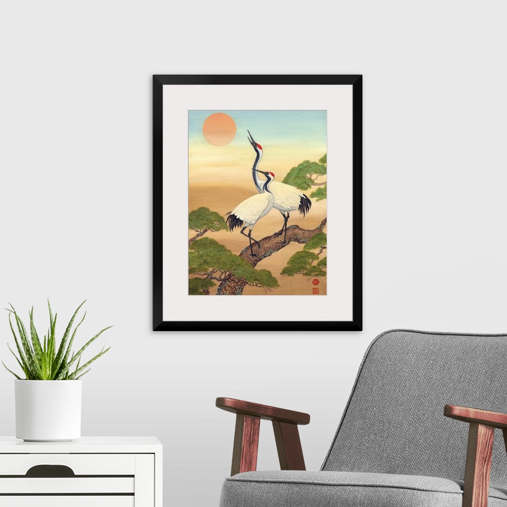 A modern room featuring Asian style painting of two cranes perched in a tree, looking at the sun.
