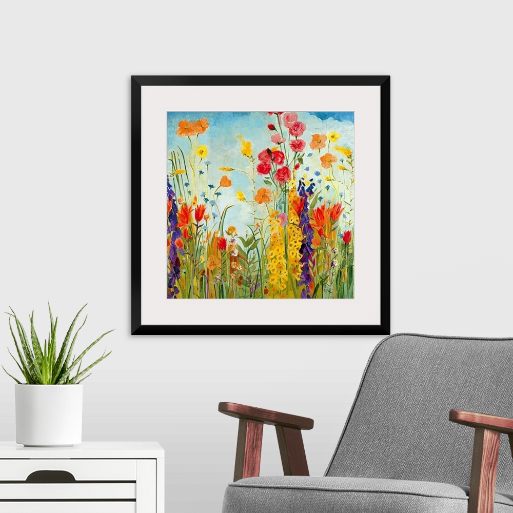 A modern room featuring A square, contemporary painting of a variety of flowers on a sunny day. Floral wall art perfect f...