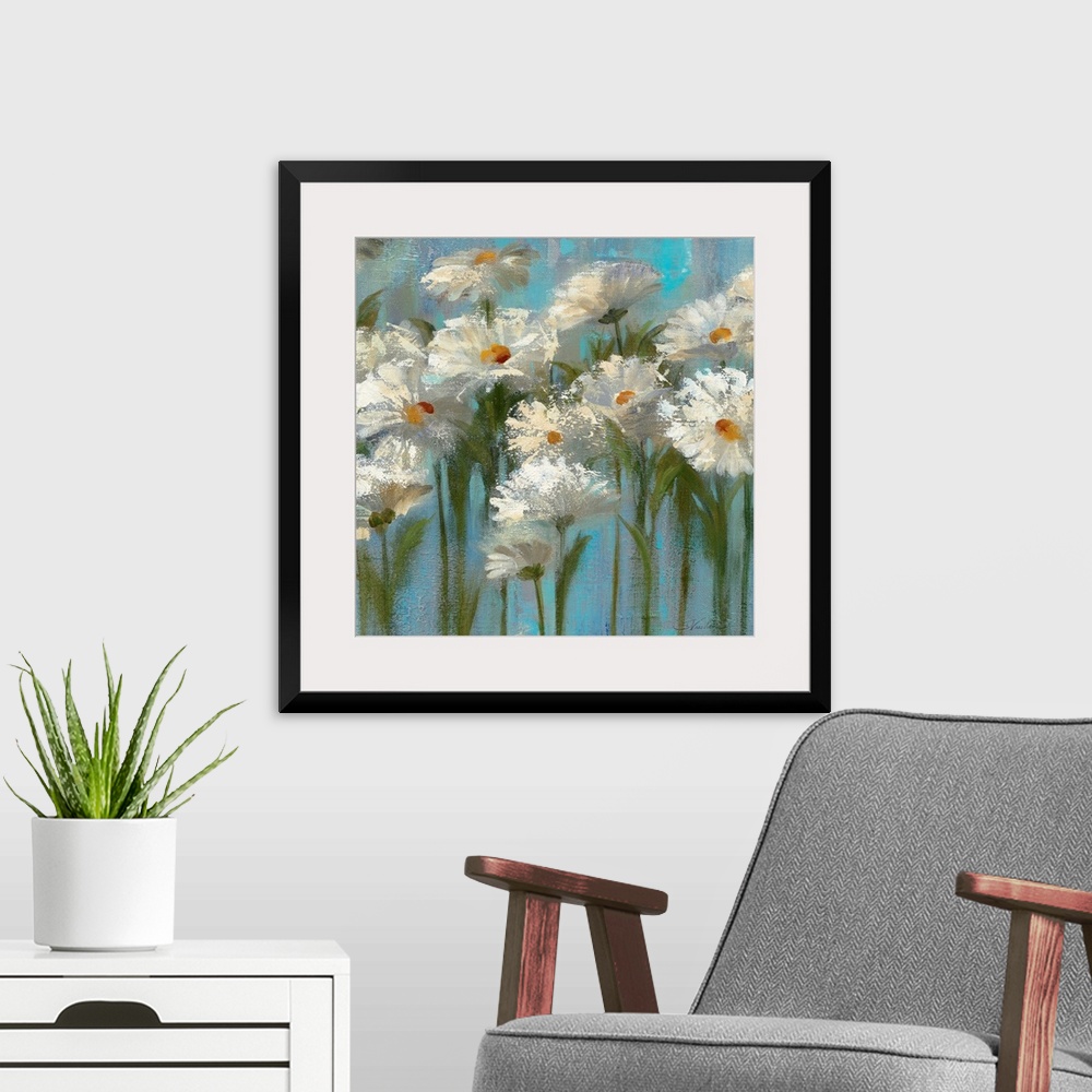 A modern room featuring This big canvas wall art is a contemporary painting of several impressionistic flowers against a ...