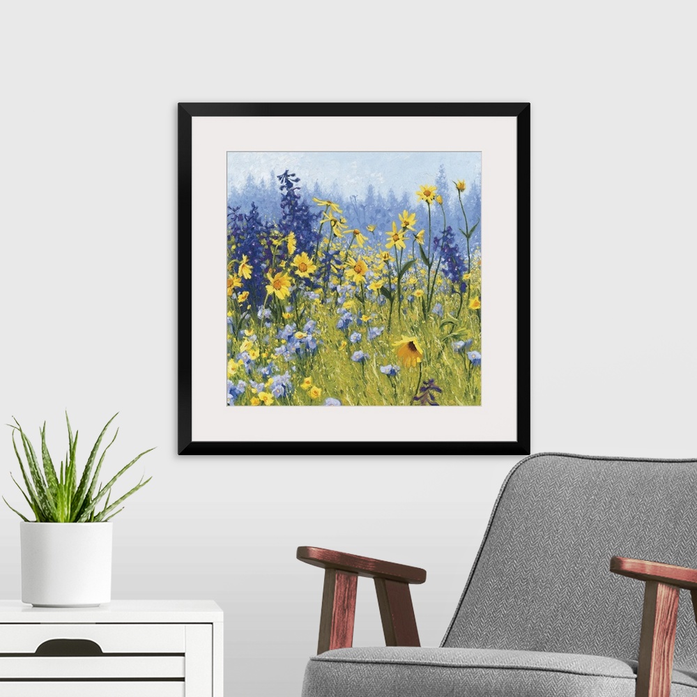 A modern room featuring Contemporary painting of a field of wildflowers with blue, green, purple, and yellow hues.