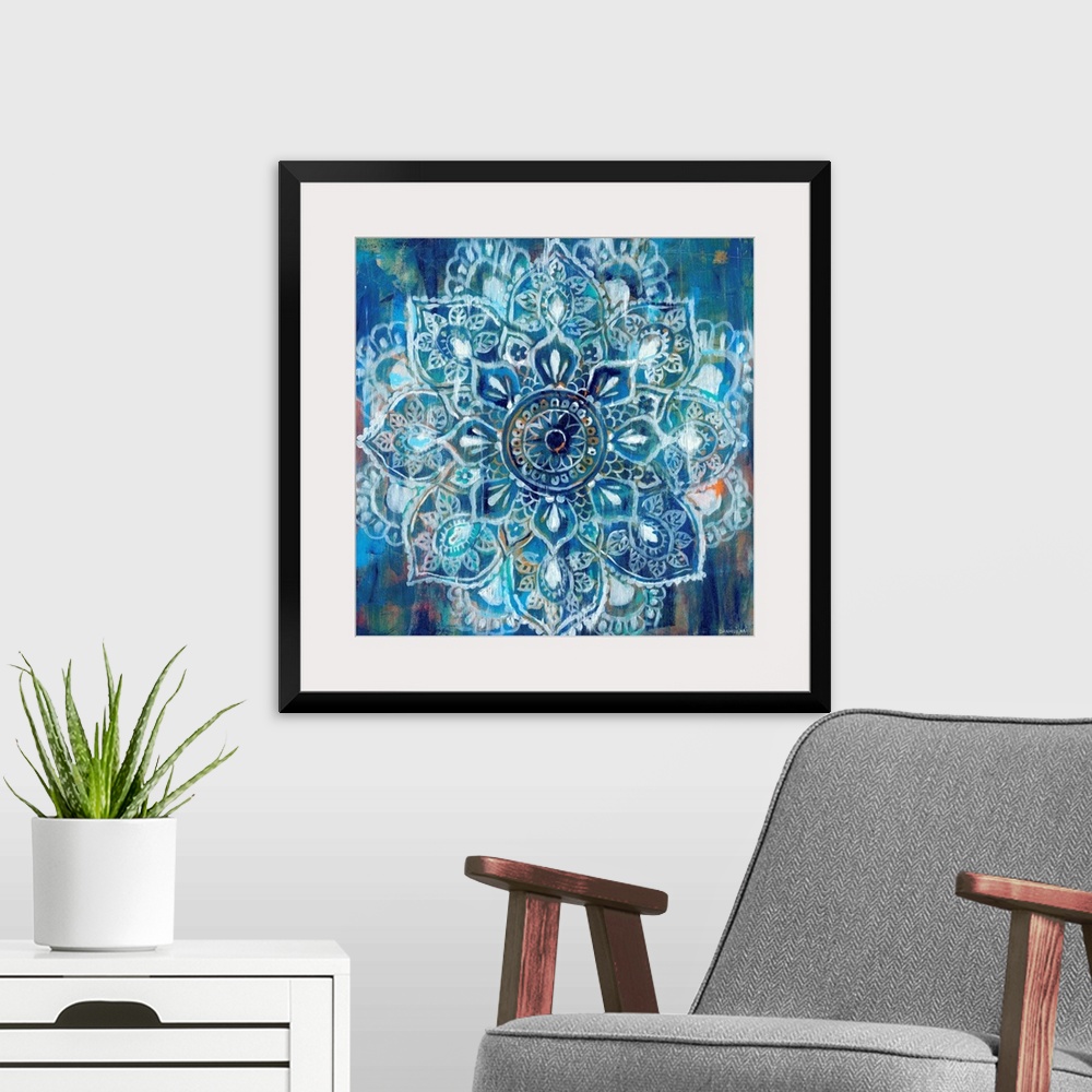 A modern room featuring Contemporary artwork of a mandala using predominantly blue.