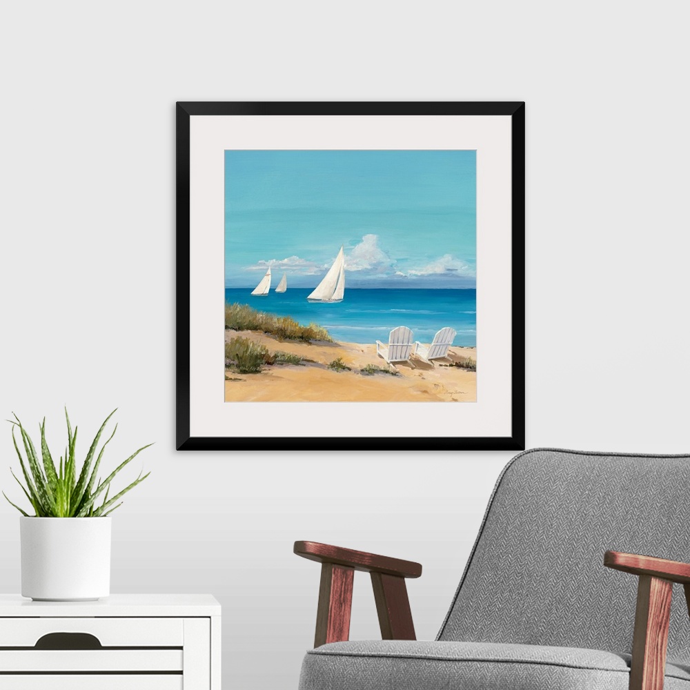 A modern room featuring Large contemporary art shows a trio of sailboats traveling through the open waters of an ocean on...