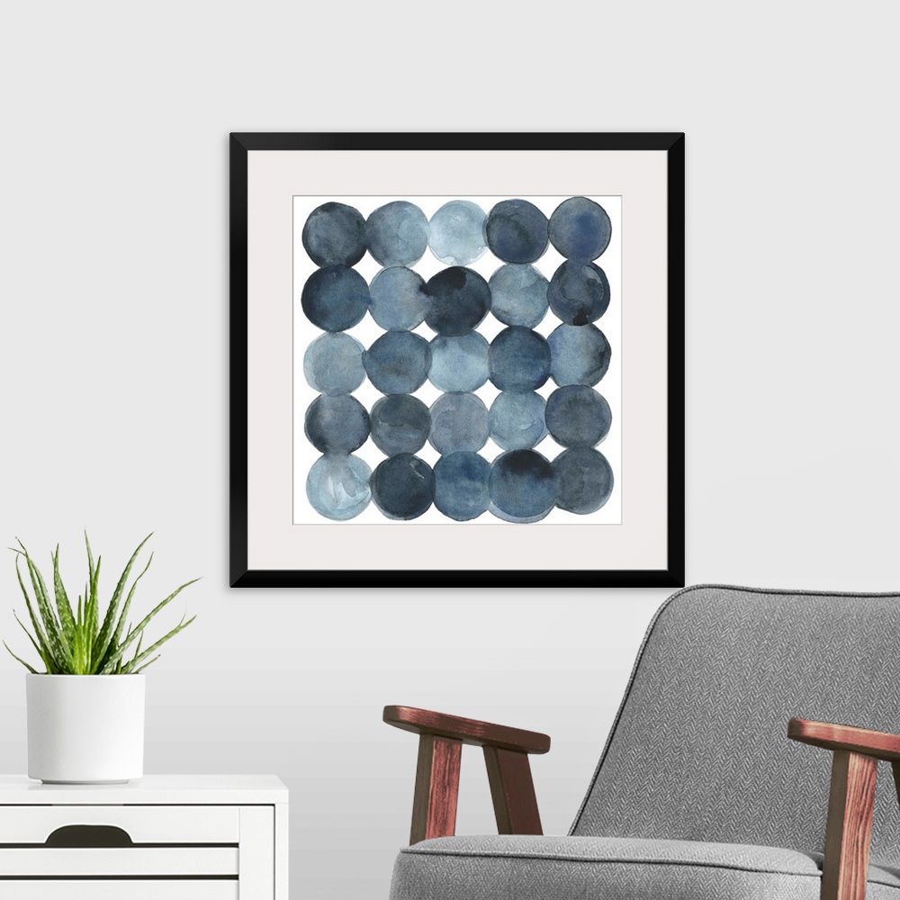 A modern room featuring Dot-patterned abstract watercolor painting of blue-gray tones.