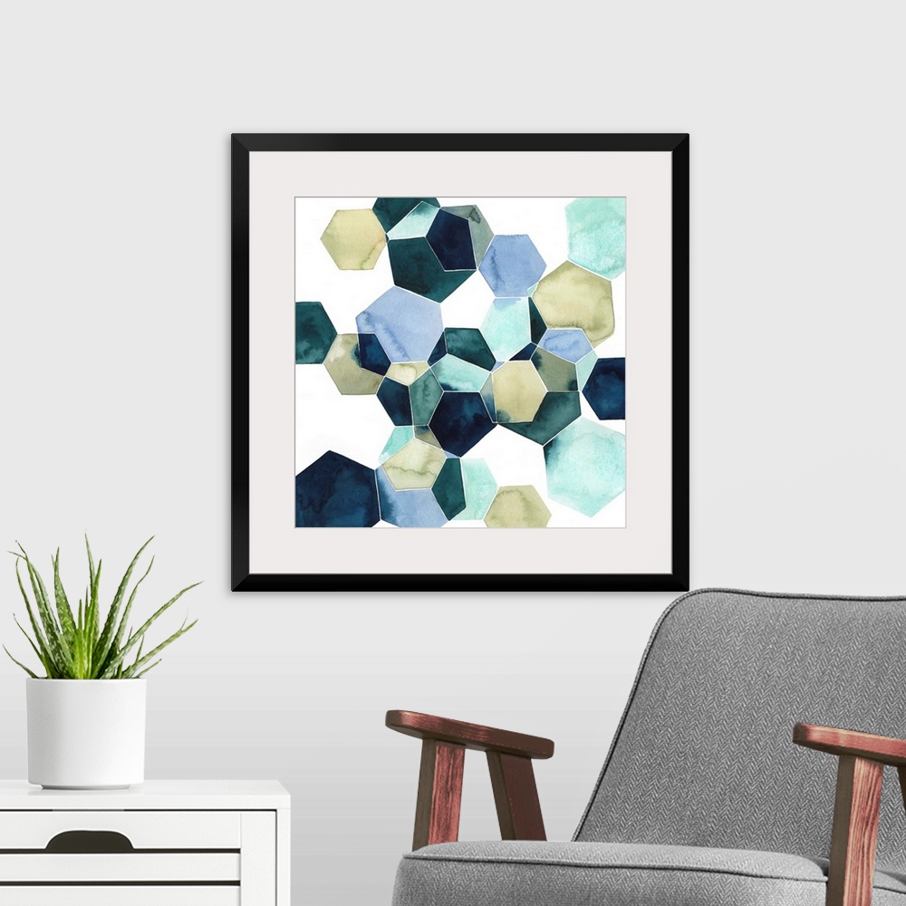 A modern room featuring Watercolor geometric painting of intersecting hexagons in blue tones.