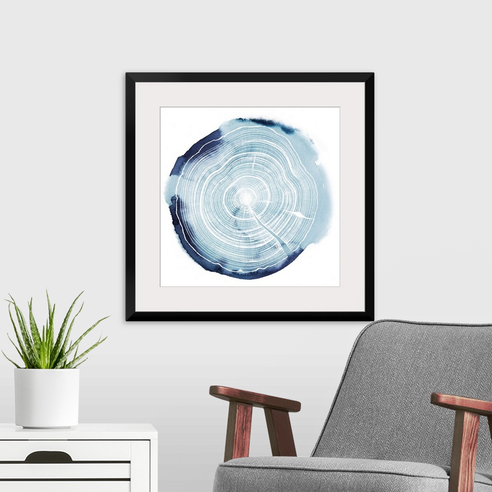 A modern room featuring Watercolor impression of a tree trunk cross-section.