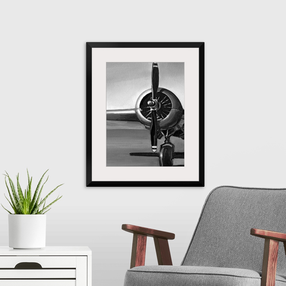 A modern room featuring Vertical, oversized artwork of a wing, propeller and wheel on a vintage airplane, casting a shado...