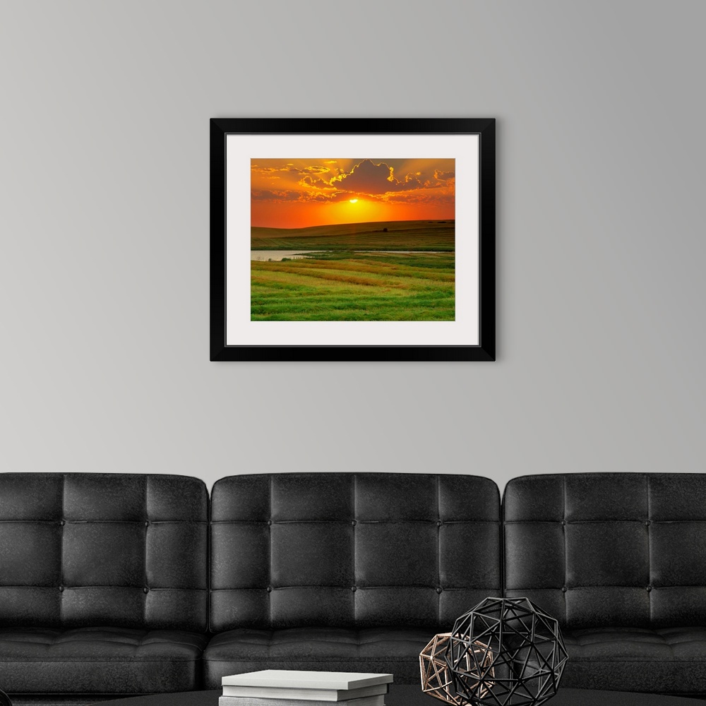 A modern room featuring Sunset Over Harvested Canola Field, Saint Denis, Saskatchewan, Canada