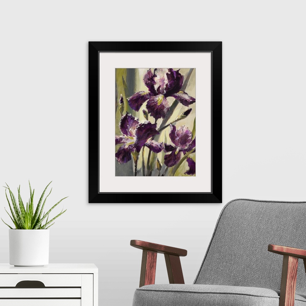 A modern room featuring Contemporary painting of three purple iris flowers.