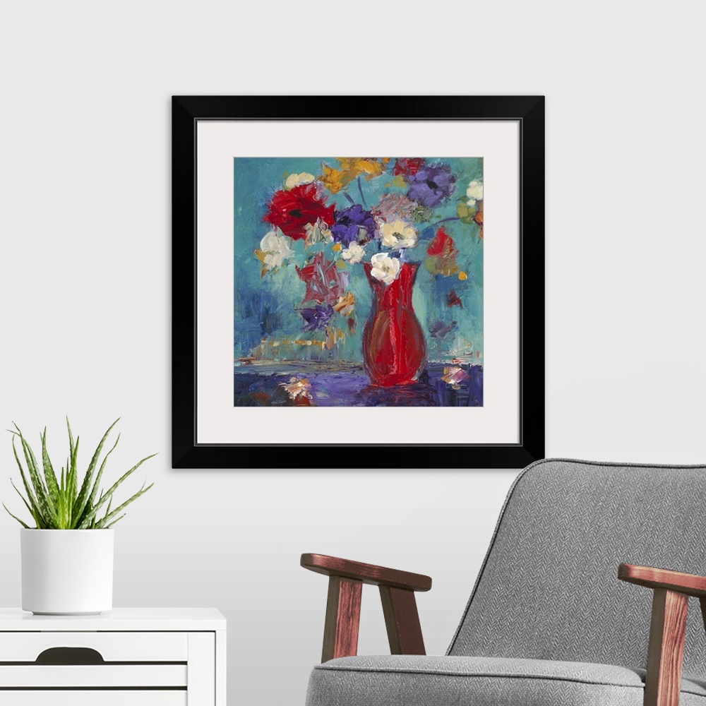A modern room featuring Contemporary still life painting of a red vase filled with colorful flowers.