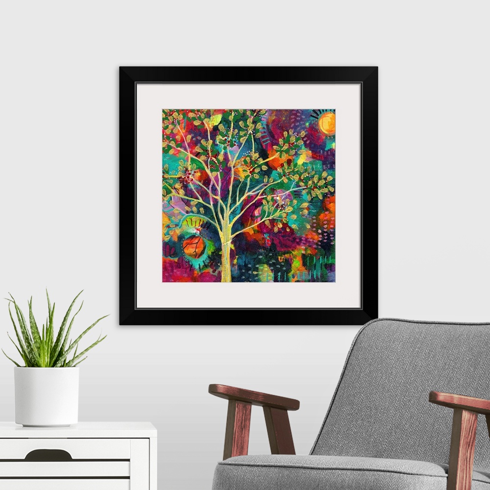 A modern room featuring Abstract painting of a golden tree on a busy, colorful, square background with a sun on each side.